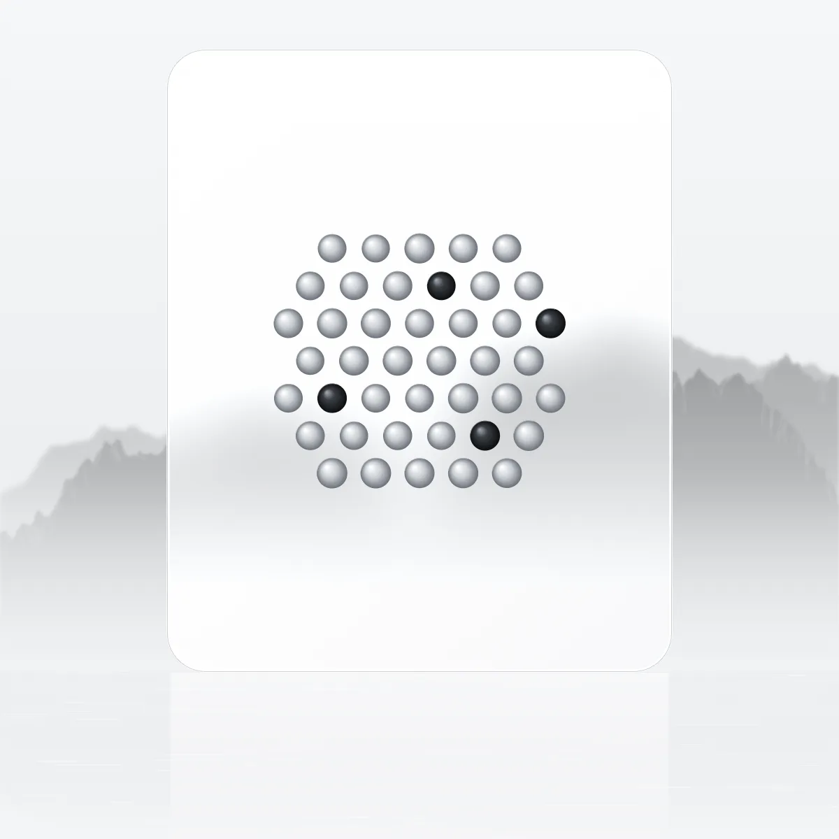 A frosted glass slab holding a lattice of identical beads, a few of them dark